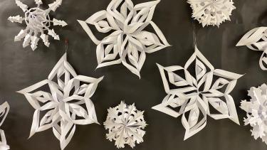 White snowflakes on black background