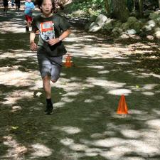 student running on the trail