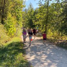 Students running on the trail