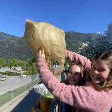 Student throwing off their egg drop contraption